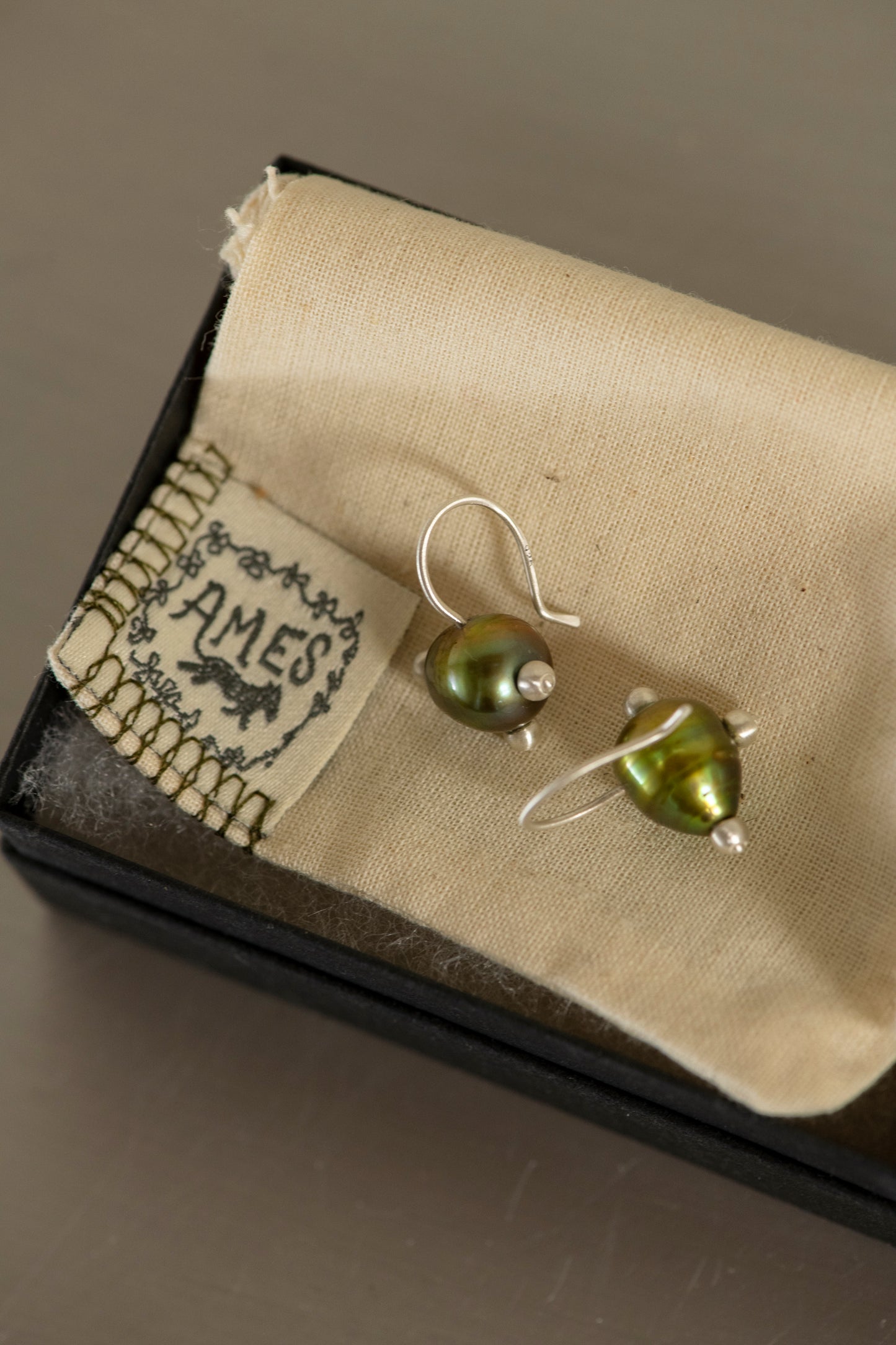 pin cushion pearl earrings