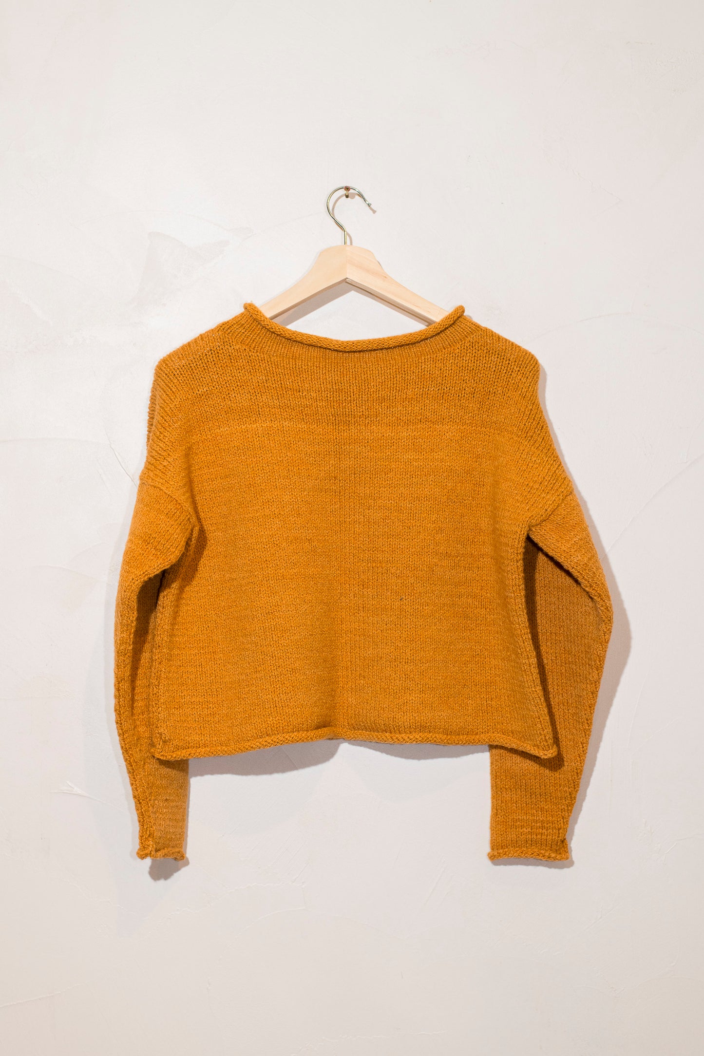 rolled edge sweater