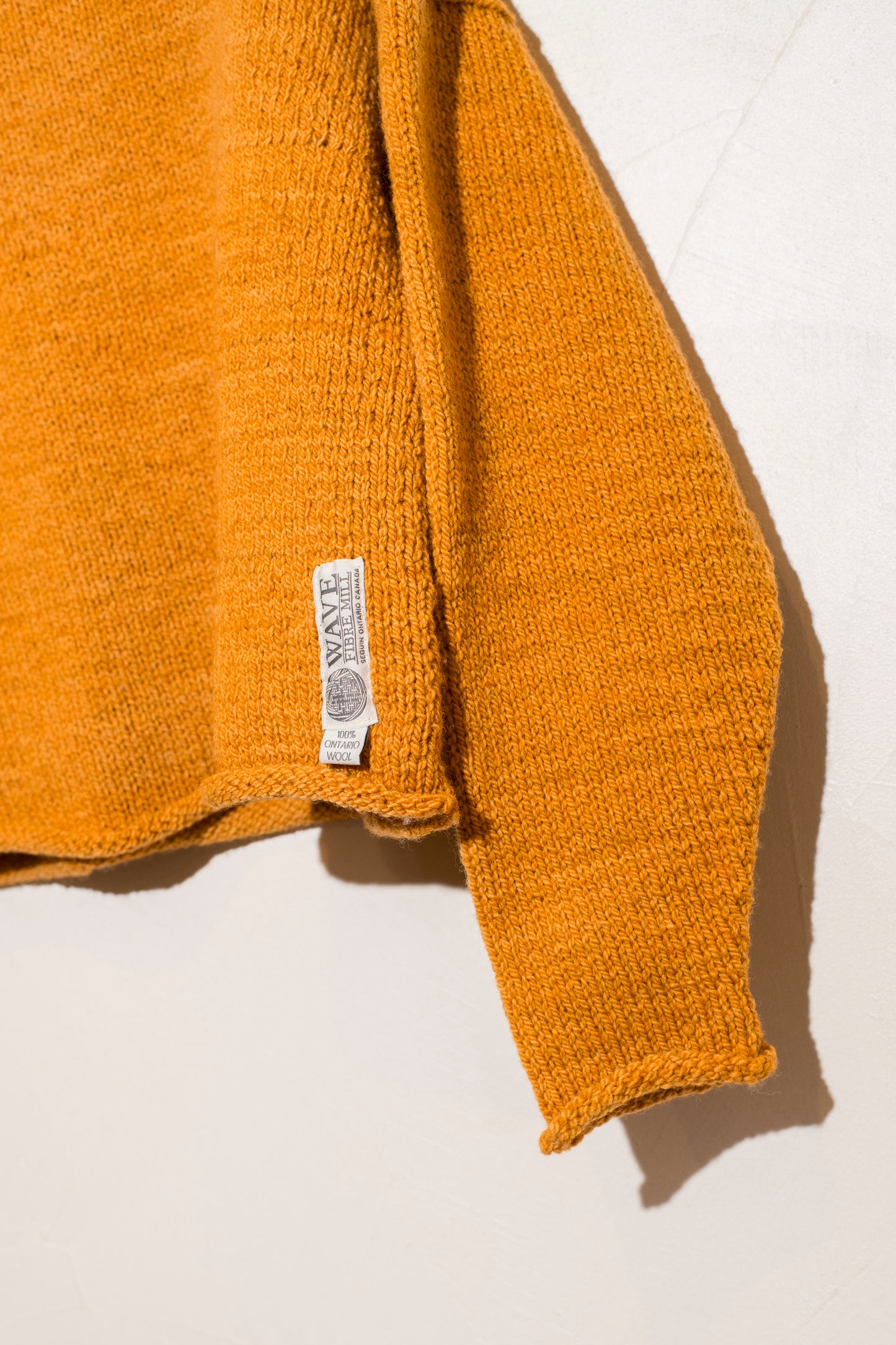 rolled edge sweater